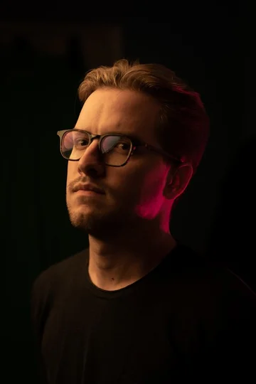 Mateusz Zieliński Zdjęcie portretowe Mateusza Zielińskiego.